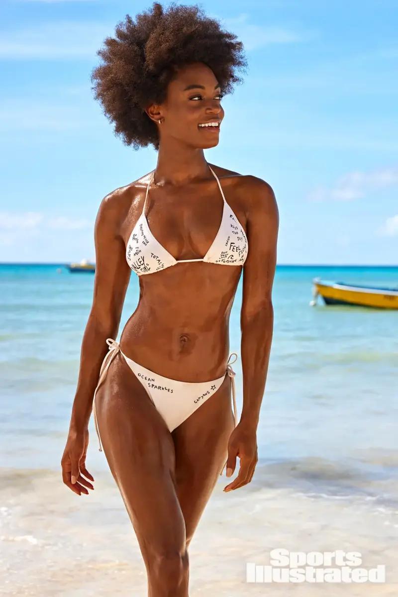 Tanaye White was photographed by Ben Watts in Barbados. Swimsuit by Bāben. Earrings by BaubleBar.